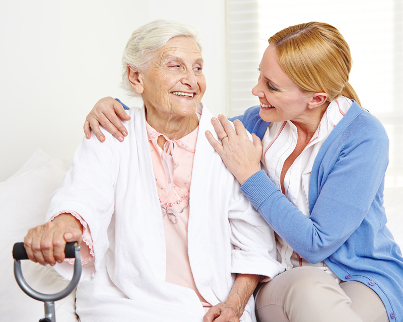 Senior receiving assisted living care at seniors community in Squamish