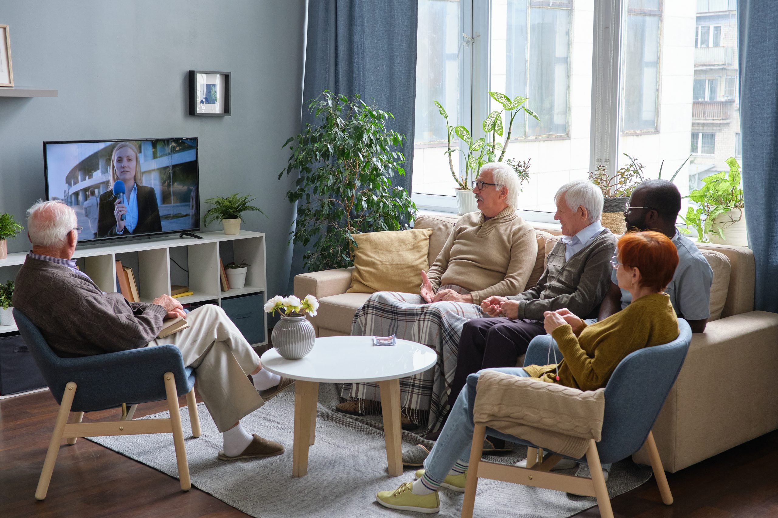 Senior people sitting in the living room