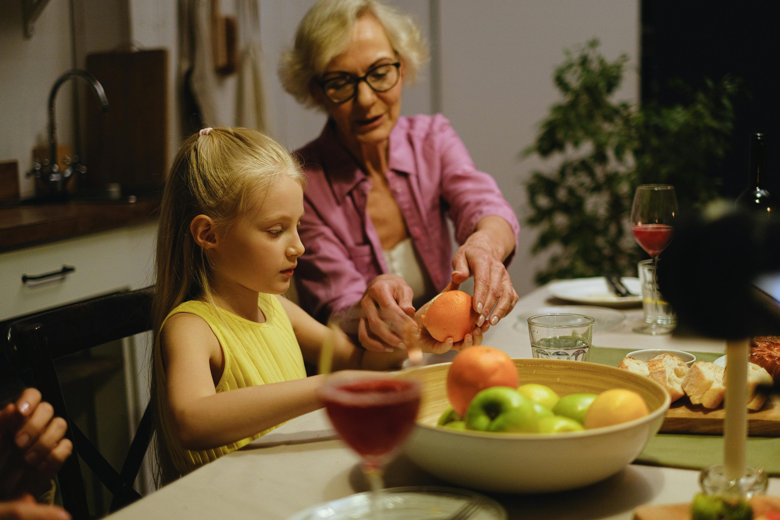 grandma and granddaughter in kitchen